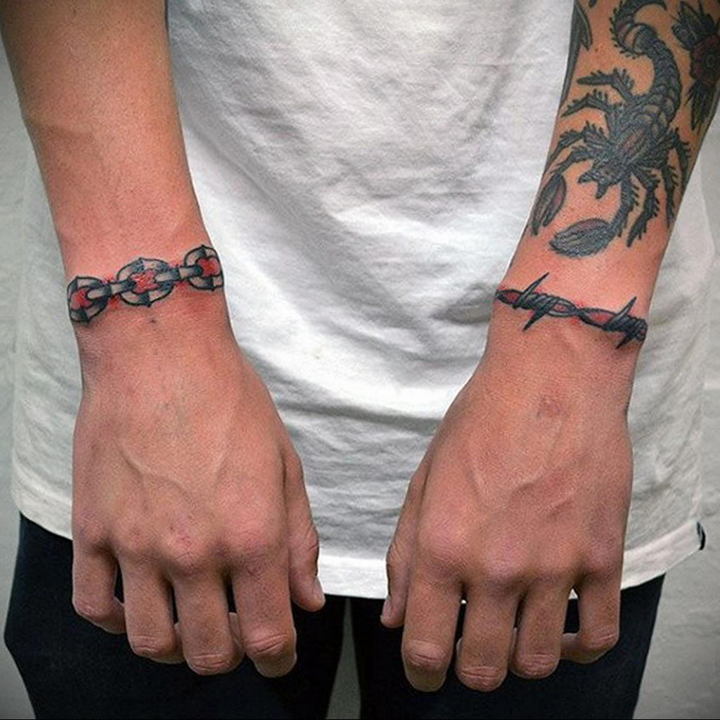 barb wire sleeve tattoo