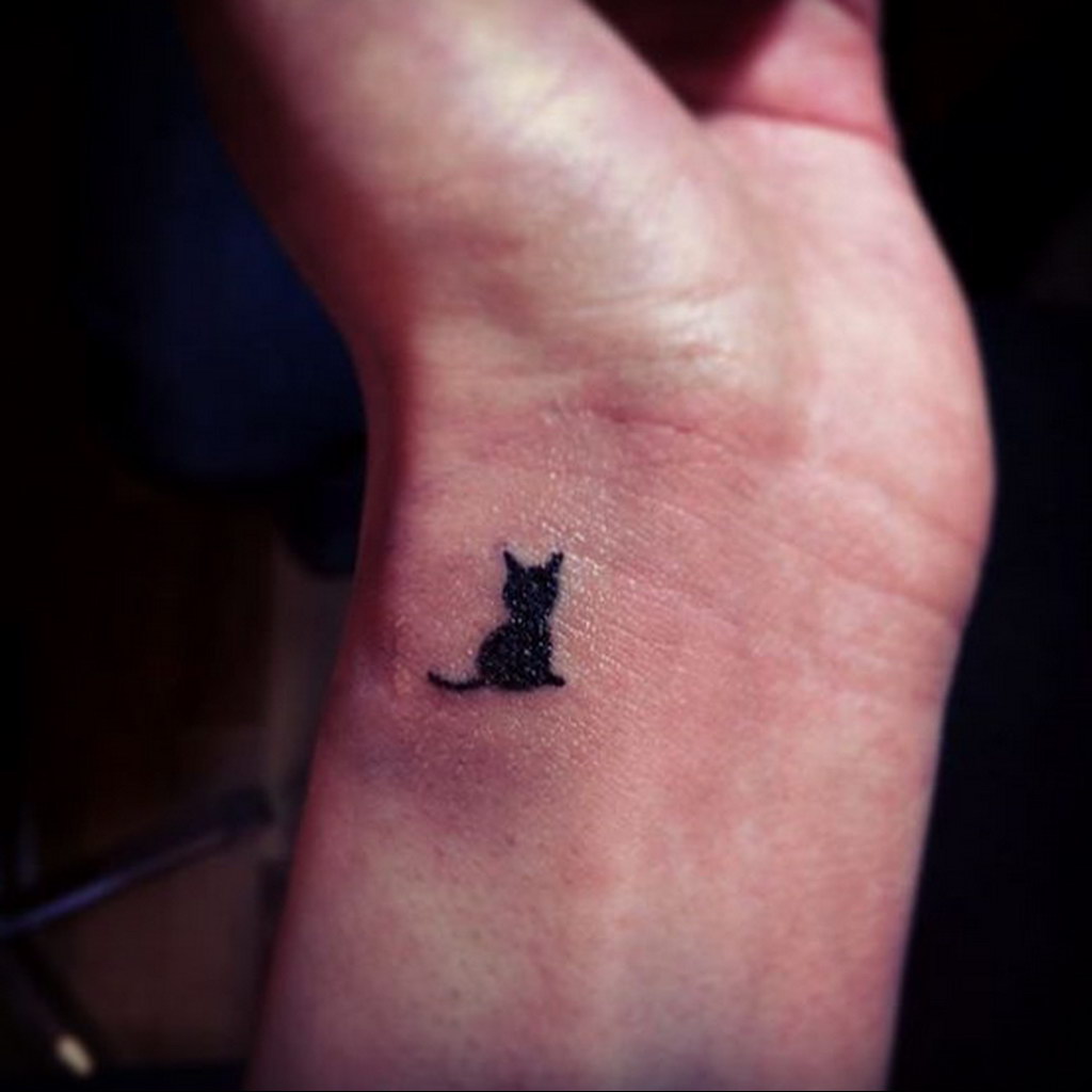 cat tattoo on the wrist 03.12.2019 №004 -cat tattoo- tattoovalue.net