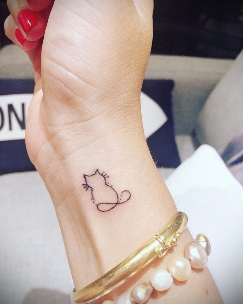 cat tattoo on the wrist 03.12.2019 №005 -cat tattoo- tattoovalue.net