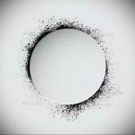 Blackwork tattoo of a circle created from scattered dots and splatters on a grey background, abstract design, textured effect, modern ink.
