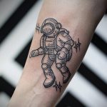 cosmonaut tattoo on arm 01.02.2020 №007 -tattoo astronaut- tattoovalue.net