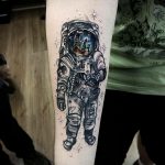 cosmonaut tattoo on arm 01.02.2020 №027 -tattoo astronaut- tattoovalue.net
