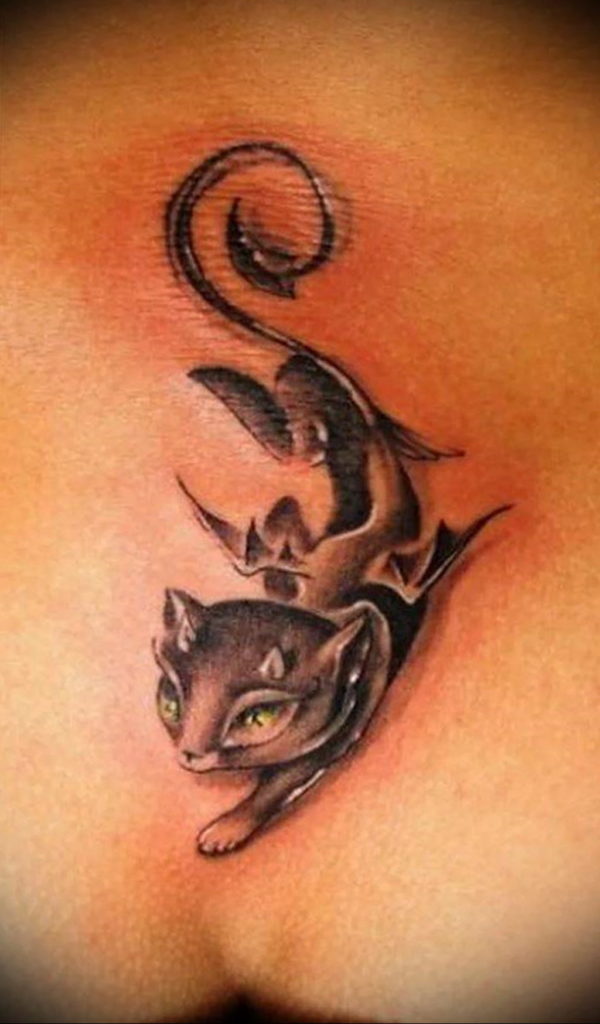 tattoo cat on the lower back 03.12.2019 №009 -cat tattoo- tattoovalue.net