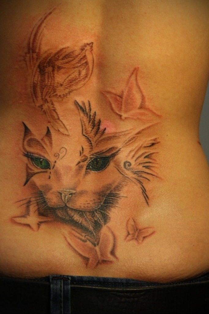 tattoo cat on the lower back 03.12.2019 №012 -cat tattoo- tattoovalue.net