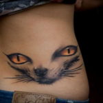 tattoo cat on the lower back 03.12.2019 №014 -cat tattoo- tattoovalue.net