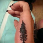 tattoo fir tree on hand 25.11.2019 №002 -tattoo spruce- tattoovalue.net