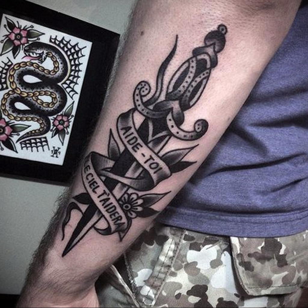 Dagger tattoo meaning: facts, features, photo examples, sketches