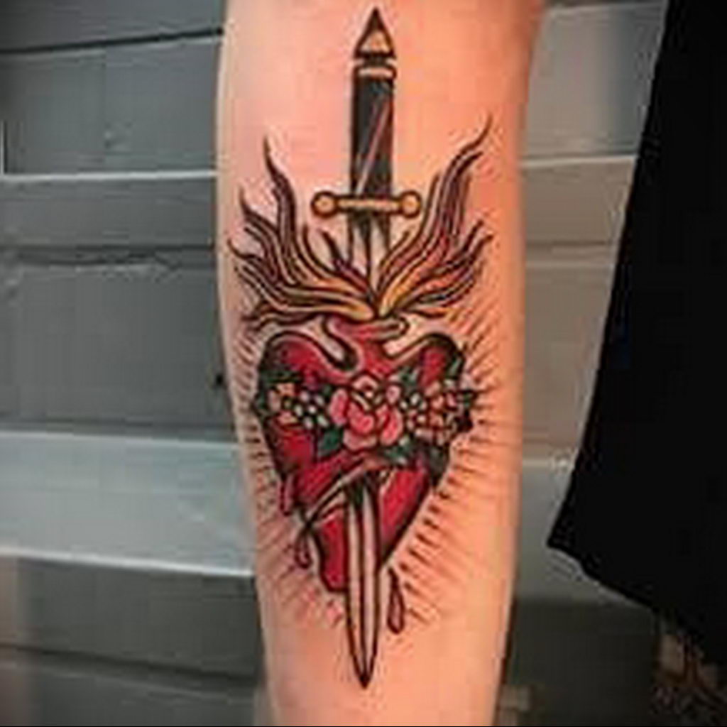 Stylized dagger stabbed heart tattoo  Tattoogridnet