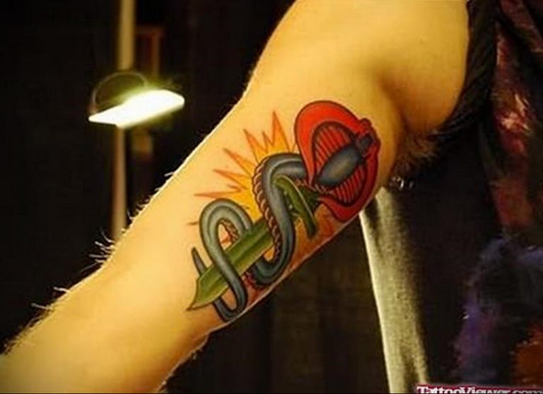1. Dagger Tattoo with Flower Design Ideas - wide 8