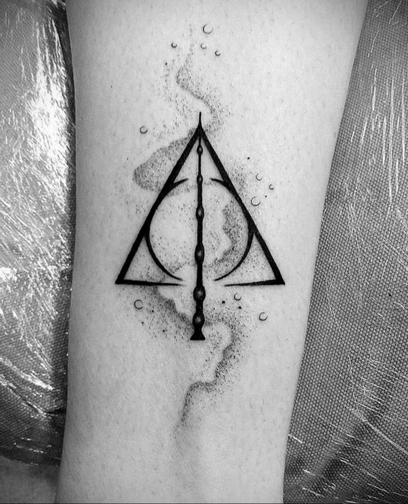Meaning of the deathly hallows tattoo: features, photo examples of  drawings, sketches, facts