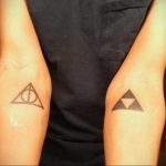 дары смерти тату на руке 19.01.2020 №031 -deathly hallows tattoo on arm- tattoovalue.net