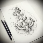 Black and grey sketch of an anchor intertwined with a rose, featuring detailed shading and linework, ideal for a shoulder or back piece.