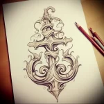 Intricate black and grey tattoo sketch of an anchor enveloped in swirling baroque-style designs, ideal for a back or shoulder.