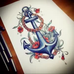 Colorful sketch of an anchor surrounded by vibrant red poppies and rope, showcasing a traditional tattoo style. Ideal for arm or leg placement.