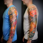 Japanese-style tattoo sleeve featuring a vibrant phoenix and blooming flowers, on the arm. Bold colors, dynamic composition, and intricate details characterize this design.