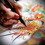 What are the best ink colors for tattoos - A close up of a colorful tattoo design being drawn o fd b a bcc f - 030124 tattoovalue.net 009