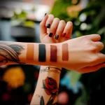 What are the best ink colors for tattoos - A person comparing tattoo colors against their skin dbc f ad a dcebd _1 - 030124 tattoovalue.net 094