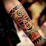 What are the best ink colors for tattoos - A person with a colorful cultural themed tattoo s ebf f ca aa dced _1_2_3 - 030124 tattoovalue.net 141