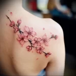 What are the best ink colors for tattoos - A person with a pink cherry blossom tattoo on their aba d fc a afbaa - 030124 tattoovalue.net 151