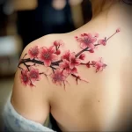 What are the best ink colors for tattoos - A person with a pink cherry blossom tattoo on their aba d fc a afbaa _1_2_3 - 030124 tattoovalue.net 154