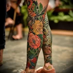 What are the best ink colors for tattoos - A stunning colorful leg tattoo displayed while walki def de f bfab fffc - 030124 tattoovalue.net 169