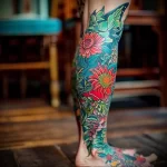 What are the best ink colors for tattoos - A stunning colorful leg tattoo displayed while walki def de f bfab fffc _1 - 030124 tattoovalue.net 170