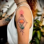 What are the best ink colors for tattoos - A woman with a chic geometric tattoo with gradient c cfe ed cc fa cacdff _1_2 - 030124 tattoovalue.net 273