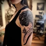 What are the best ink colors for tattoos - A woman with a sleek black panther tattoo style r ca e bc cad _1_2_3 - 030124 tattoovalue.net 290