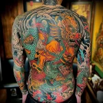 What are the best ink colors for tattoos - An impressive full back tattoo with a mix of colors e cea f acf - 030124 tattoovalue.net 317