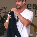 Chris Hemsworth Shows Off His New Abstract Tattoo in Sydney - 040524 tattoovalue.net 001