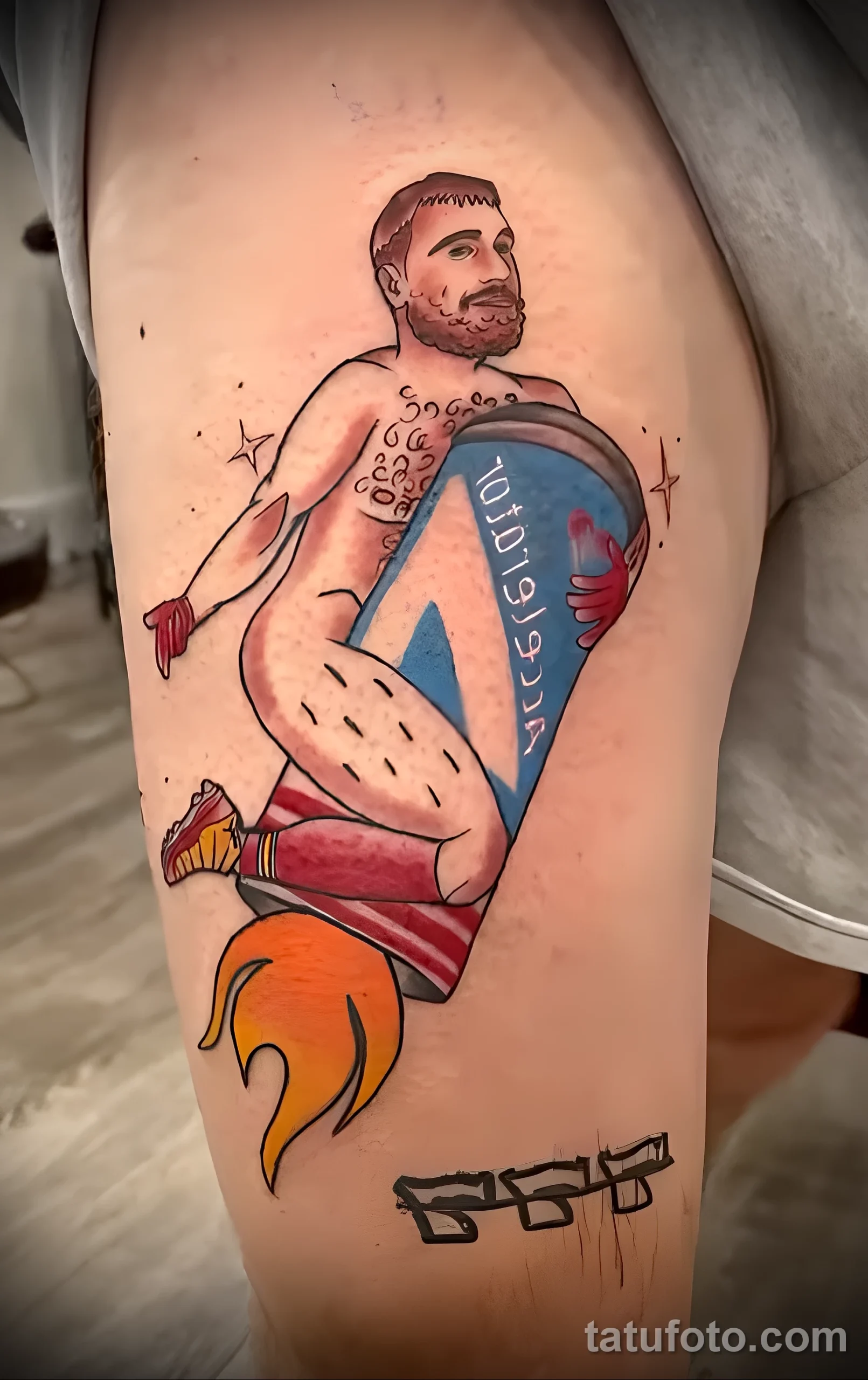 Vibrant tattoo of a muscular fighter holding a blue championship belt, with flames and stars, on a side torso. American Traditional style.