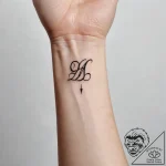 Tattoo sketch a small, hidden initial on the… – tattoo sketch (№1753817626_0, 29.07.2025 19:33) — tattoovalue.net